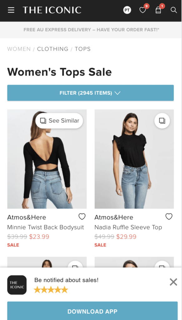 Screenshot of THE ICONIC women's top sale screen with an ad at the bottom to be notified about sales by downloading the app.